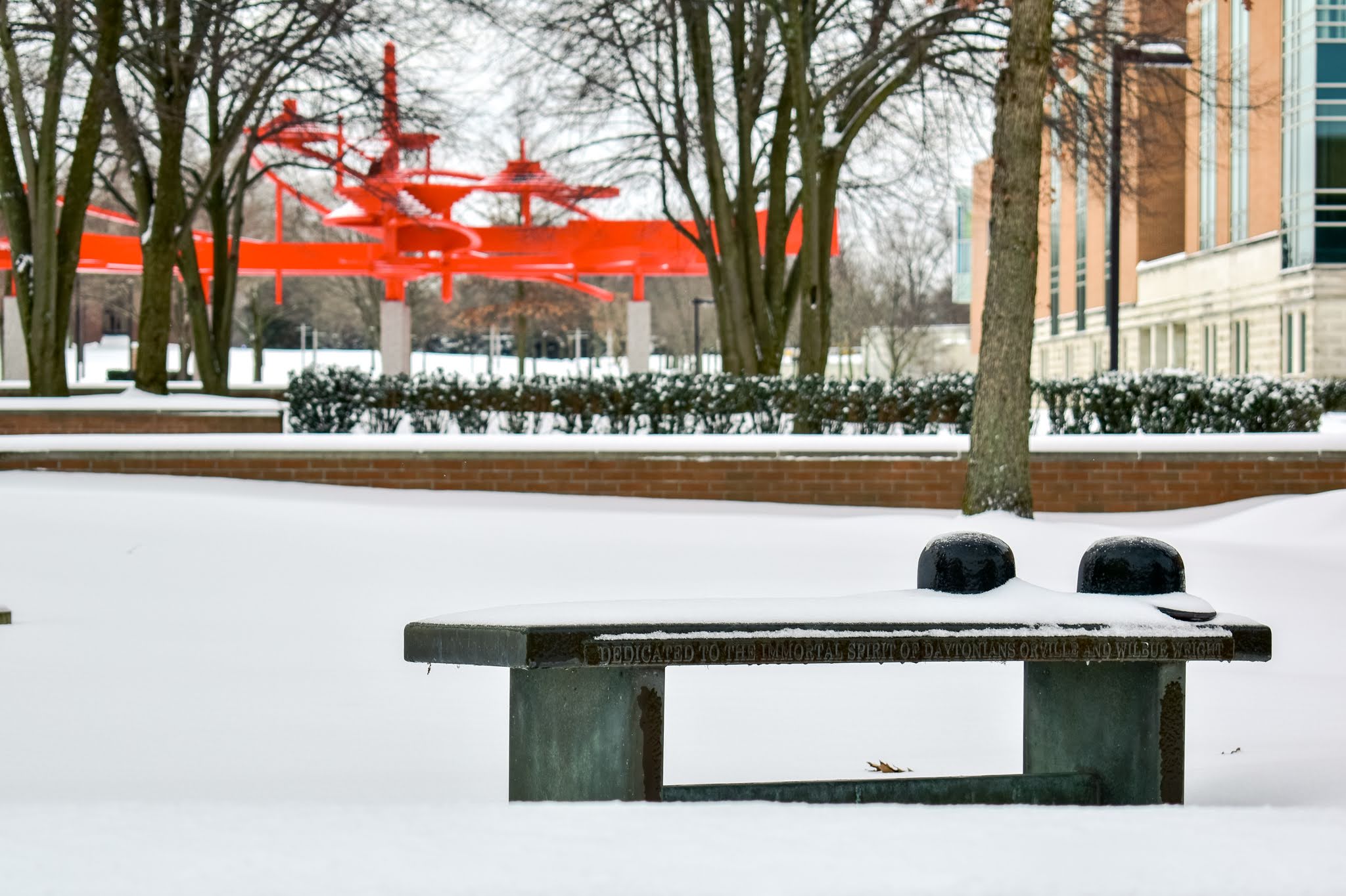 wright state campus, snow covered, BART, bench with wright brothers bowler hats